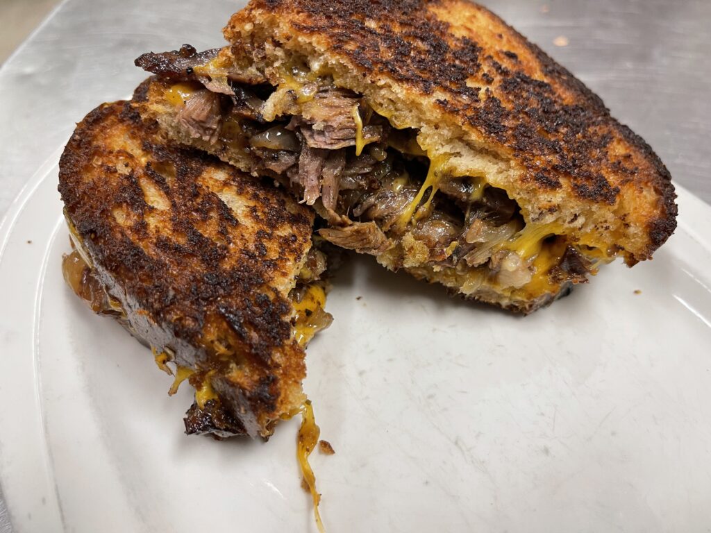 Short rib grilled cheese with caramelized onions and sharp cheddar cheese.By Chef Wendell White
